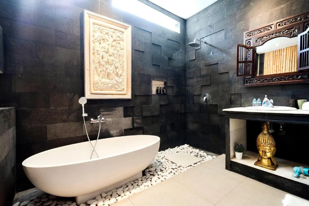 Bathroom 1 at Villa Carissa with bathtub and shower