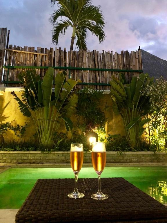 Enjoy drinks in the garden and by your private pool